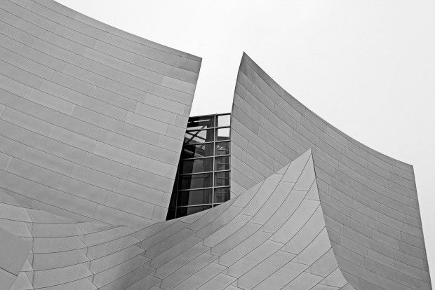 aluminum panels peel away to reveal a high hidden glass window at the Walt Disney Concert Hall, photographed by Jacob Rosenfeld